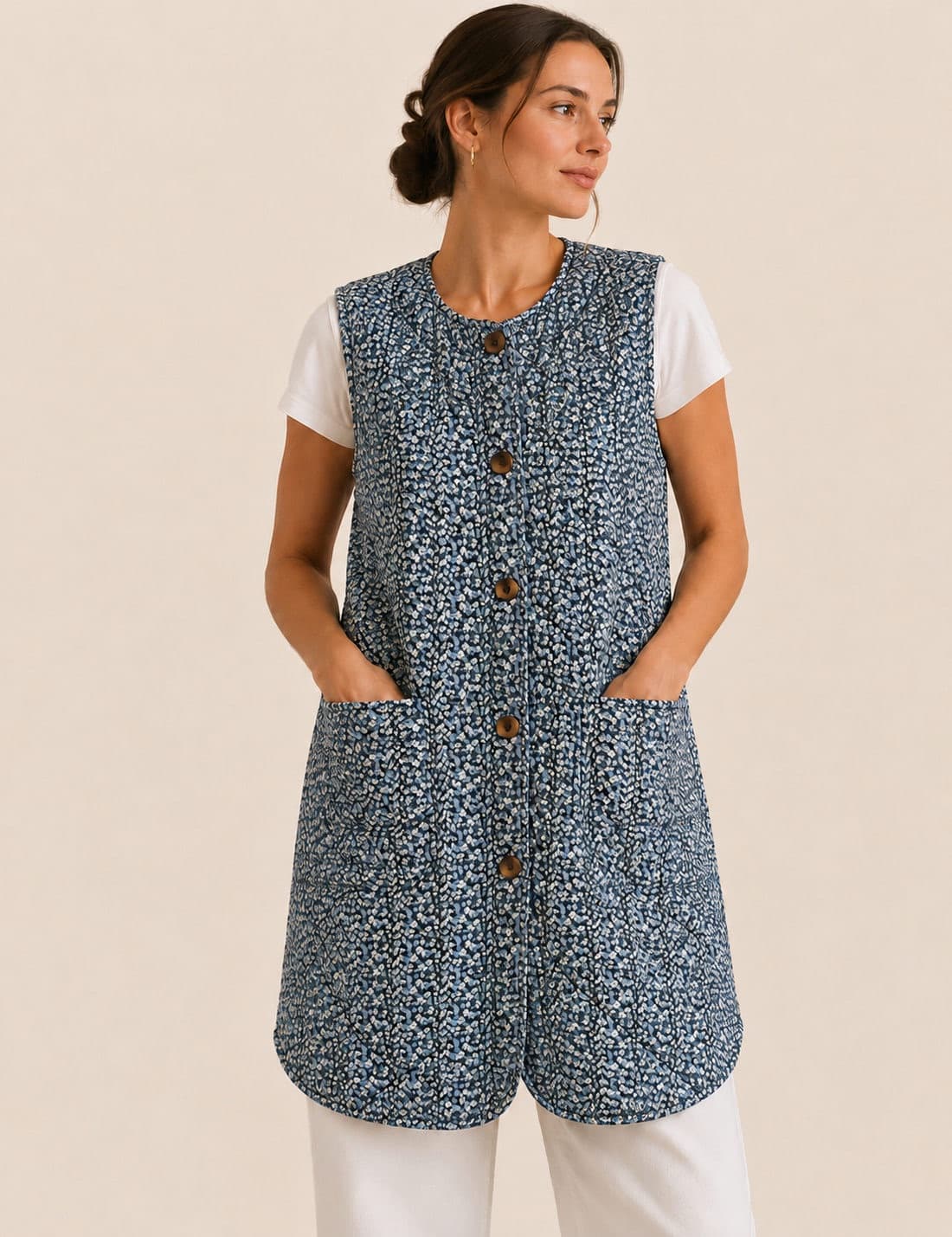 Mouwloze gewatteerde jas met blauwe bloemen Vila – Maat 38