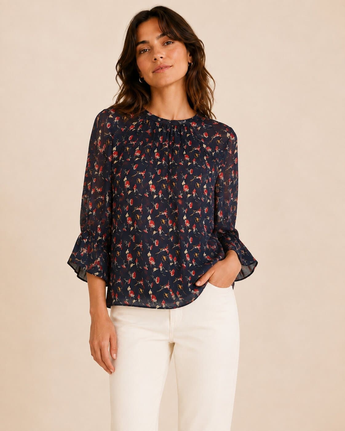 Navy blue floral blouse with flared sleeves